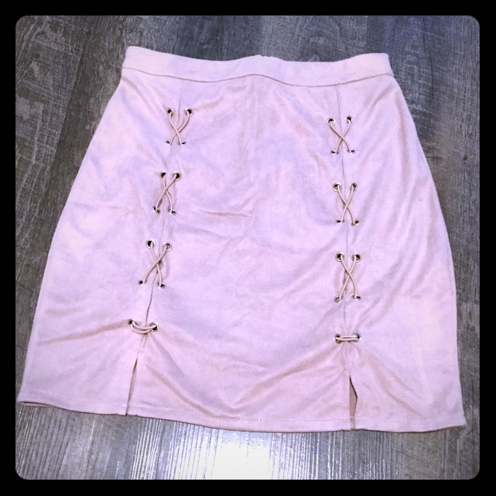 Suede like material laced up skirt.